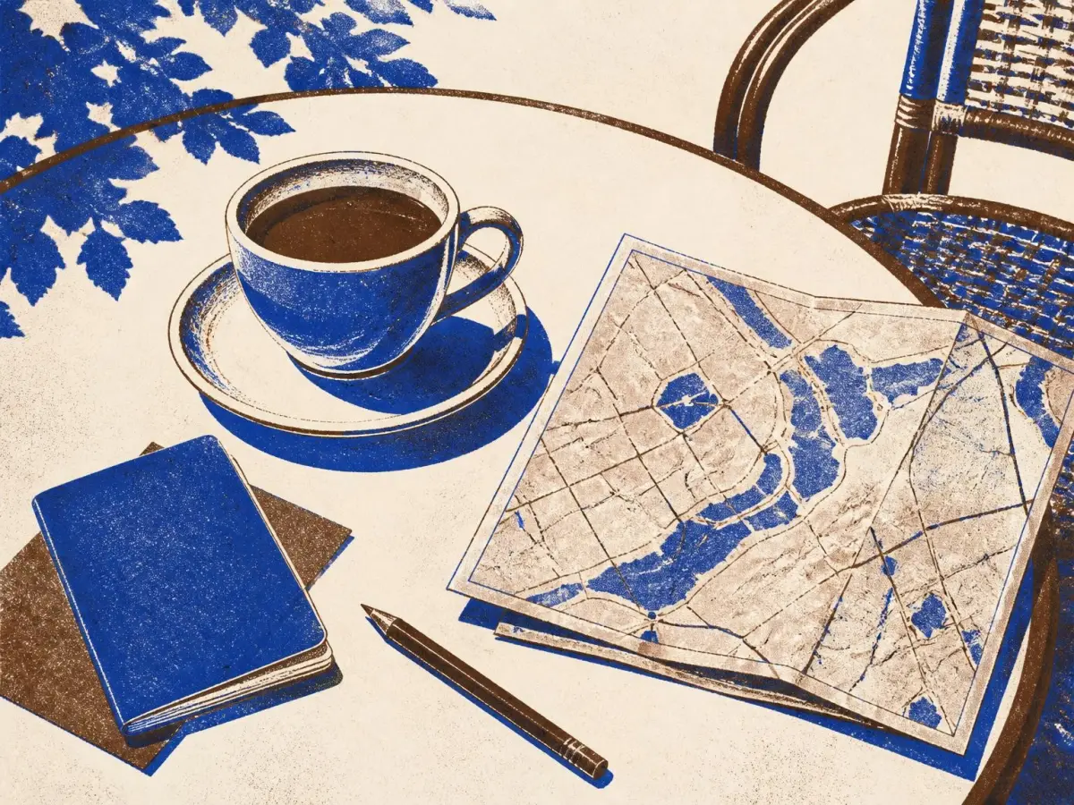 Illustration of a coffee cup on a café table beside a folded map and a passport