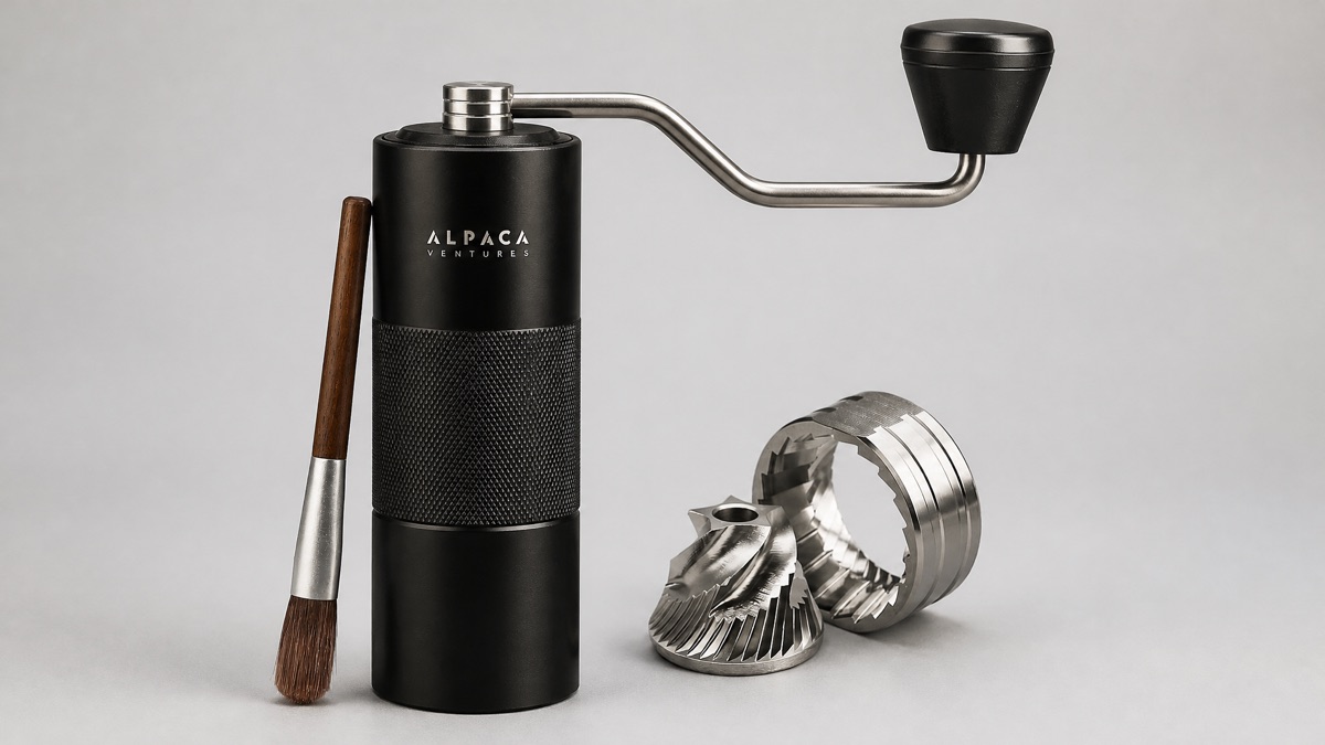 Alpaca Ventures AV1 manual coffee grinder on a plain neutral background