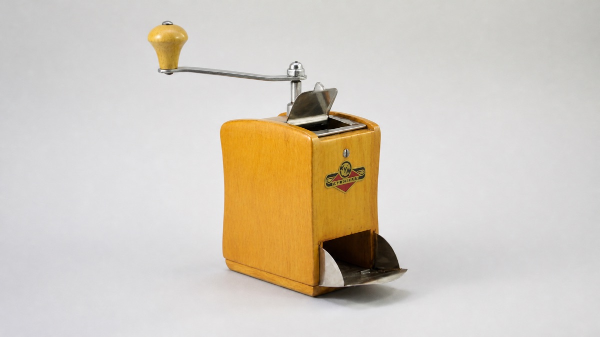 Vintage KyM wooden hand-crank coffee grinder with chrome lid and crank